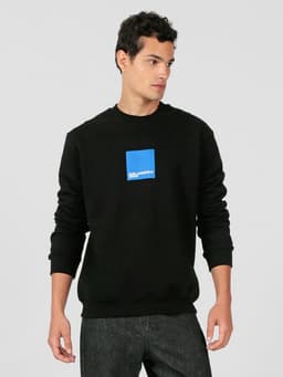 Poleron regular con logo en caja Negro Negro XL