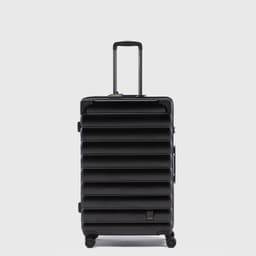 Maleta Travel Negro Essentials (23 kg) Negro L