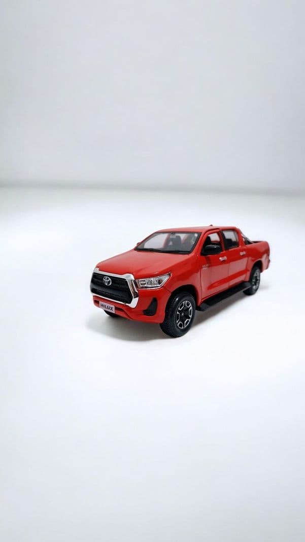 Toyota Hilux a escala 1 27 Rojo